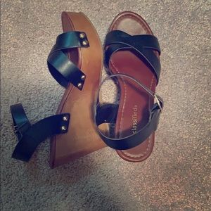 Black wedge heels with gold stud detail